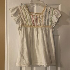 THML flows butterfly sleeved top.